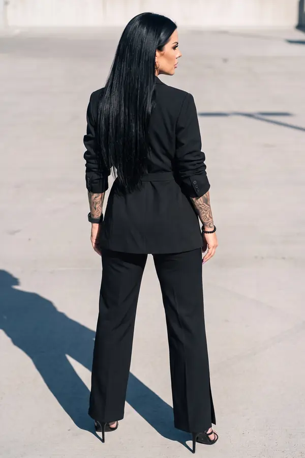 back & profile: Black buckle-strap blazer with slit-hem straight trousers