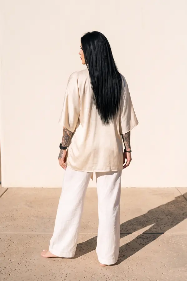 back & profile: Black halter bodysuit, satin kimono and linen trousers