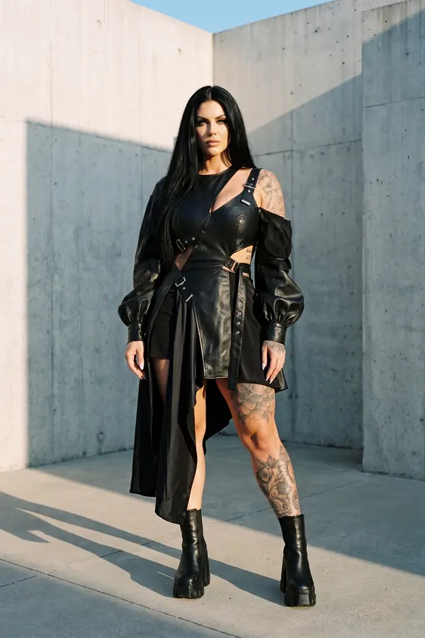 full look: Buckled leather mini dress with balloon sleeves and train