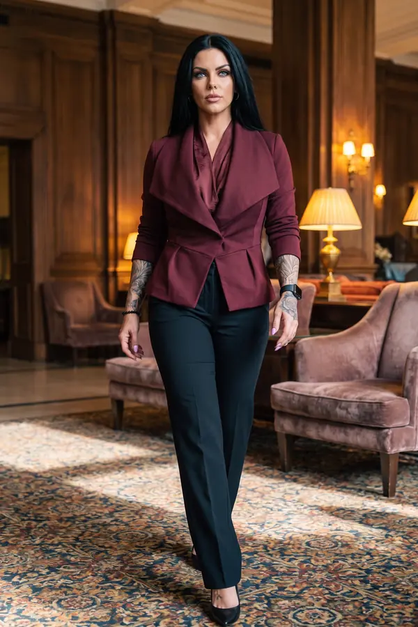 in motion: Burgundy peplum blazer with satin blouse and black trousers