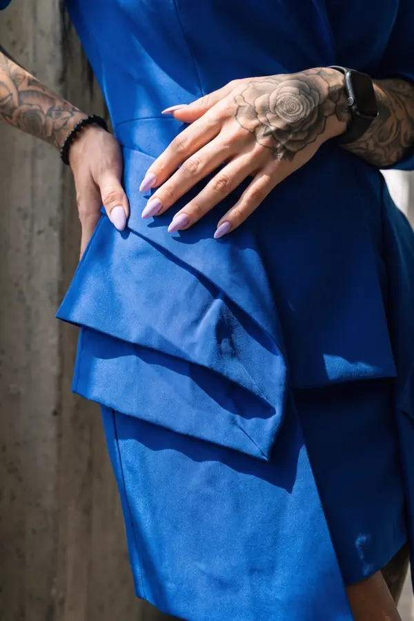 detail: Cobalt blazer dress with folded origami panels