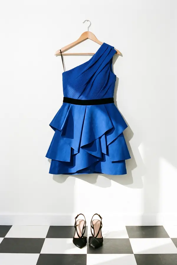 still life: Cobalt one-shoulder mini dress with a tiered origami skirt