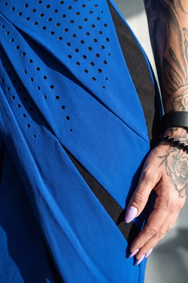 detail: Cobalt one-sleeve midi dress with black slash panels