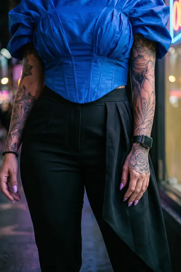 detail: Cobalt taffeta corset top with pleated tapered trousers