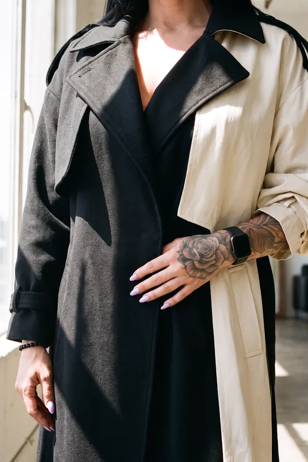 detail: Colour-block trench coat in charcoal, black and bone