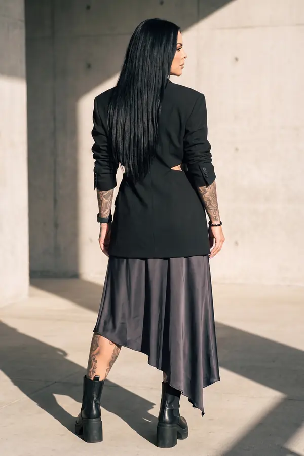 back & profile: Cut-out blazer with charcoal satin asymmetric midi skirt