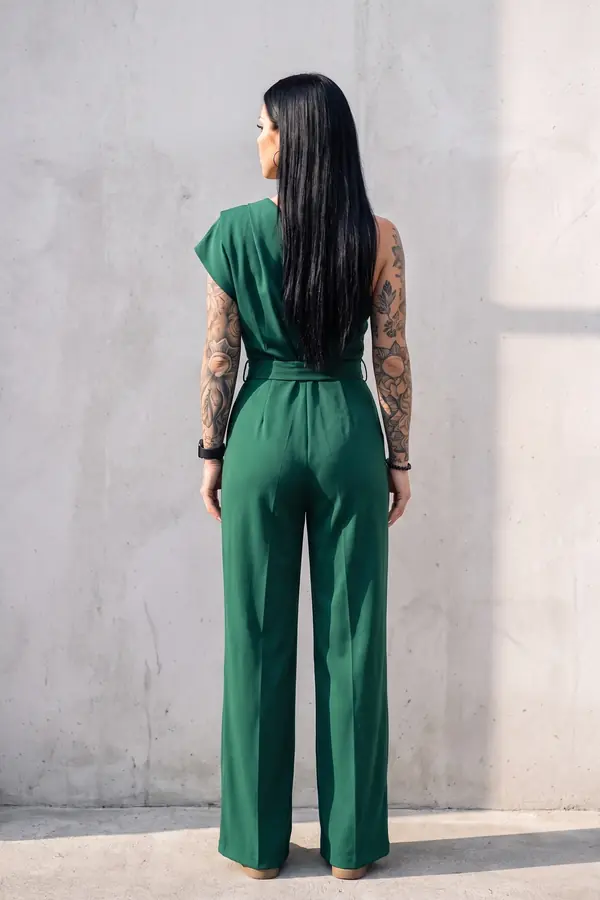back & profile: Emerald one-shoulder draped jumpsuit with buckled belt