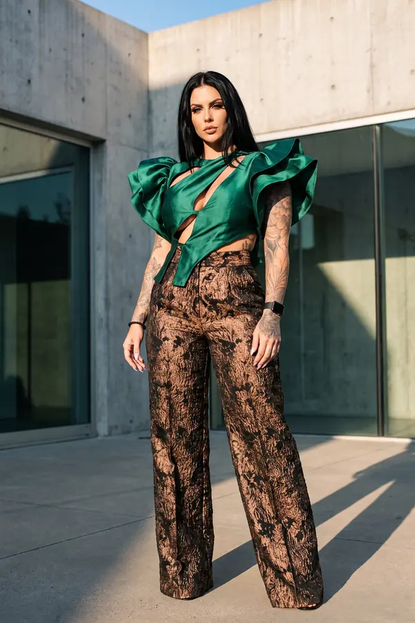 full look: Emerald ruffle cut-out top with bronze brocade trousers