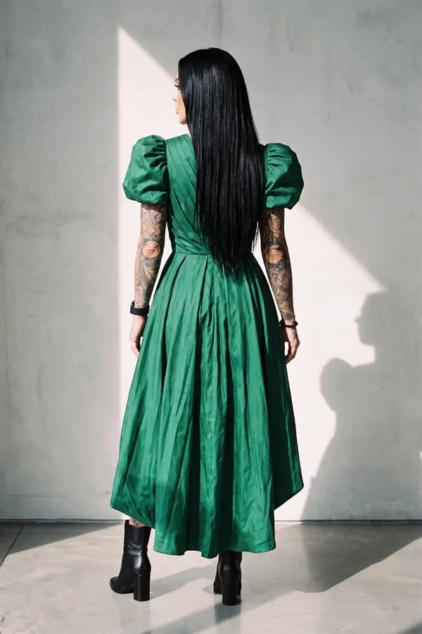 back & profile: Emerald taffeta puff-sleeve dress with bubble high-low hem