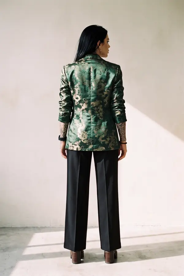 back & profile: Green and gold brocade blazer with black wide-leg trousers