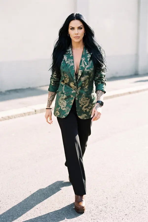 in motion: Green and gold brocade blazer with black wide-leg trousers