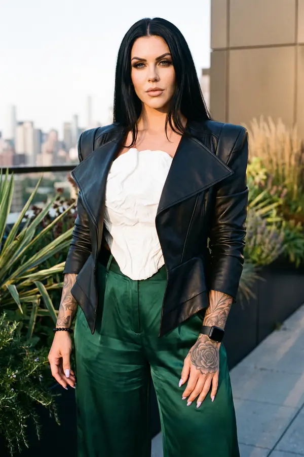 full look: Leather blazer, white corset and emerald satin trousers
