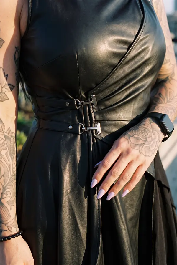 detail: Leather clasp wrap dress with a handkerchief hem