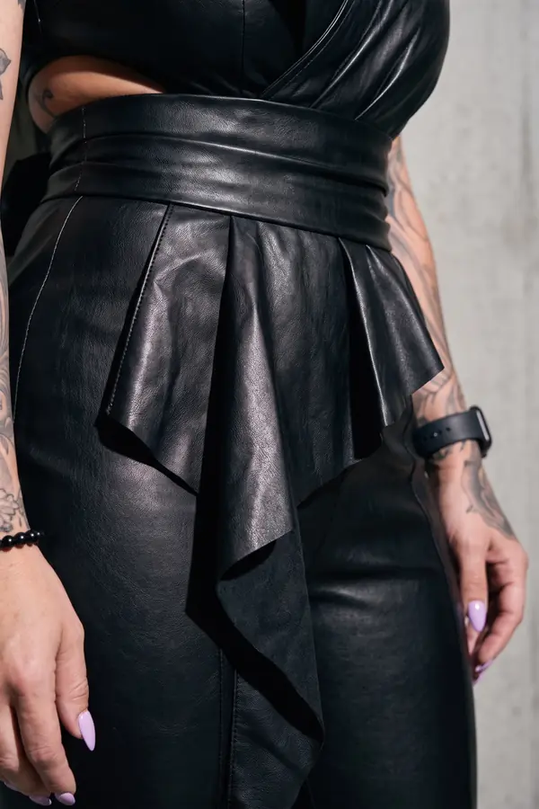 detail: Leather ruffle wrap top with sash and tapered trousers