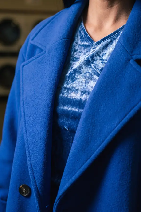 detail: Oversized cobalt wool coat with matching trousers