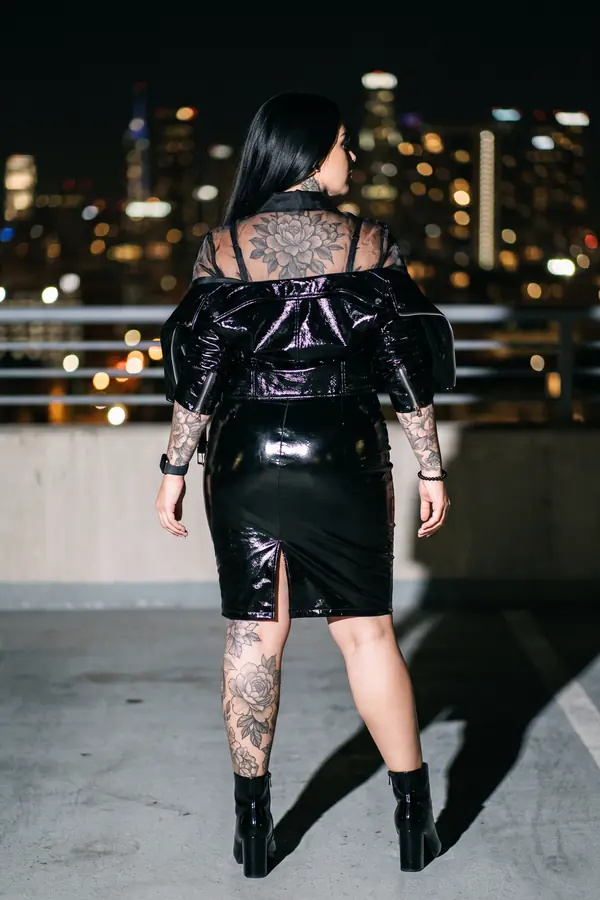 back & profile: Patent pencil skirt with an organza shirt and biker jacket