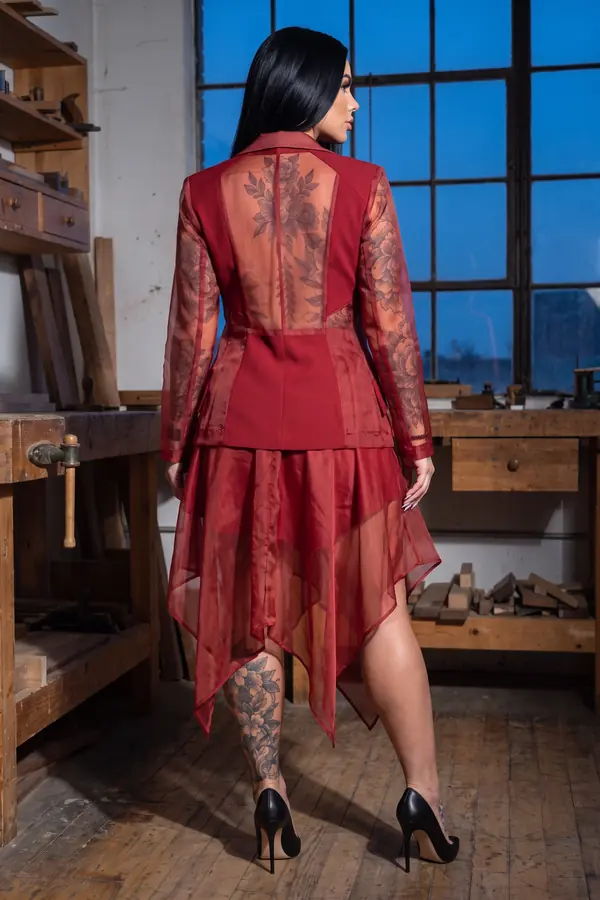 back & profile: Red crepe blazer with organza sleeves and layered skirt