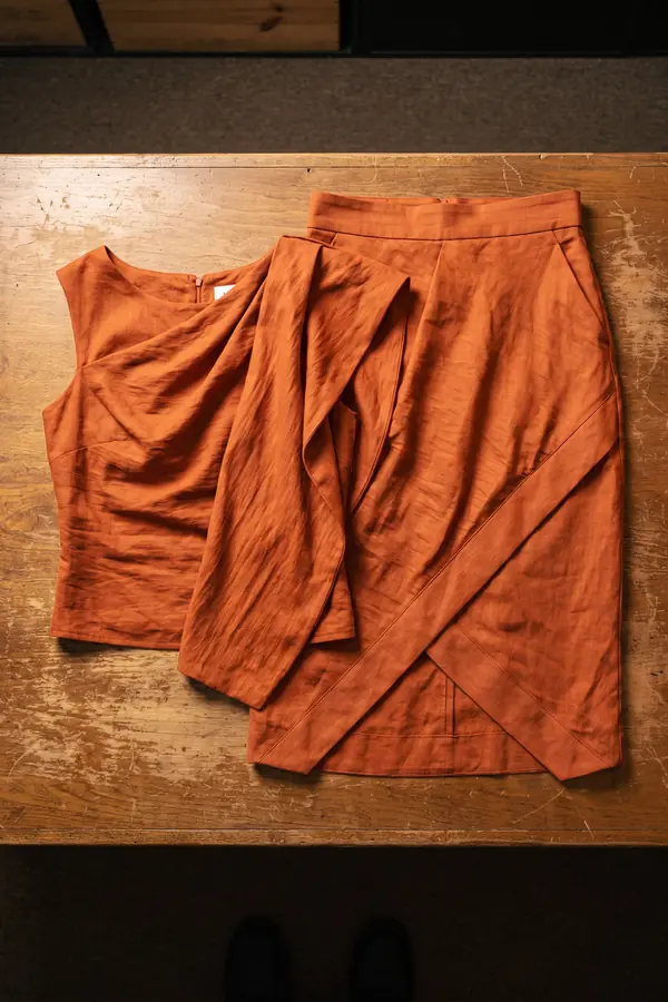 still life: Rust linen draped top with a matching wrap midi skirt