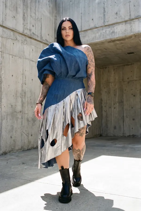 in motion: Sculpted denim dress with a silver cut-out pleated skirt